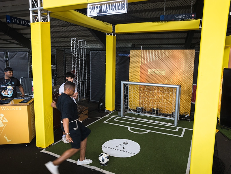 Soccer Fan Kicking At Activation